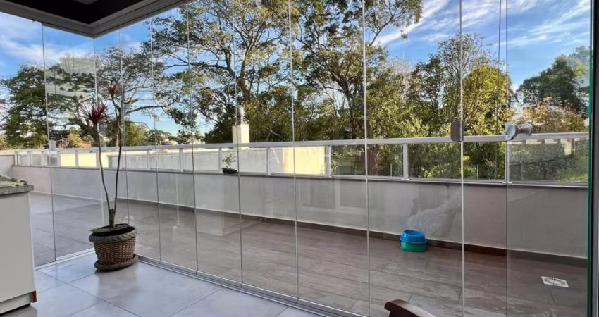 Apartamento semimobiliado com terraço no Vinhedos.