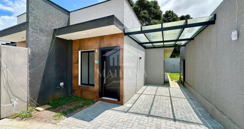 Casa com  03 dormitórios sendo 01 suíte , em condomínio fechado a venda no bairro Colônia Rio Grand