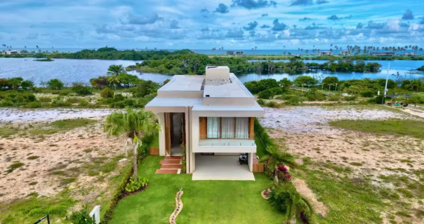 Casa a venda em alphaville guarajuba com 6 suites mobiliada vista lagoa e mar