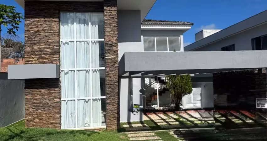 Casa a venda em alphaville litoral norte 3 com 4 suites piscina e área gourmet
