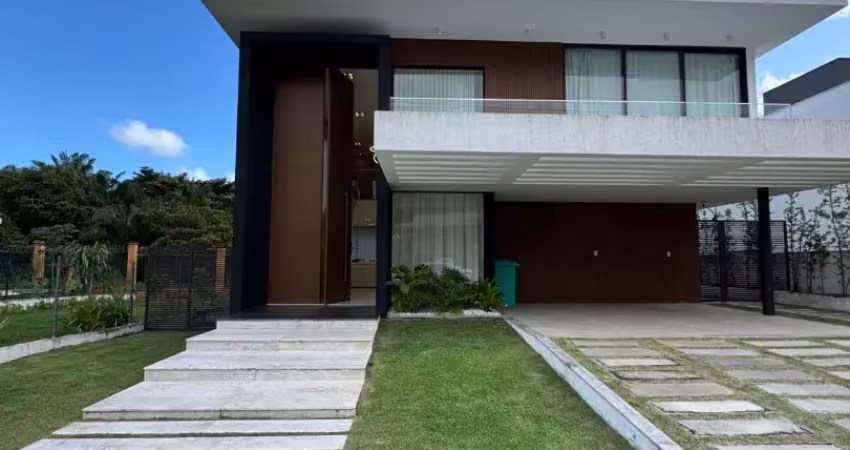Casa a venda em alphaville litoral norte 3 com 4 suites piscina e área gourmet