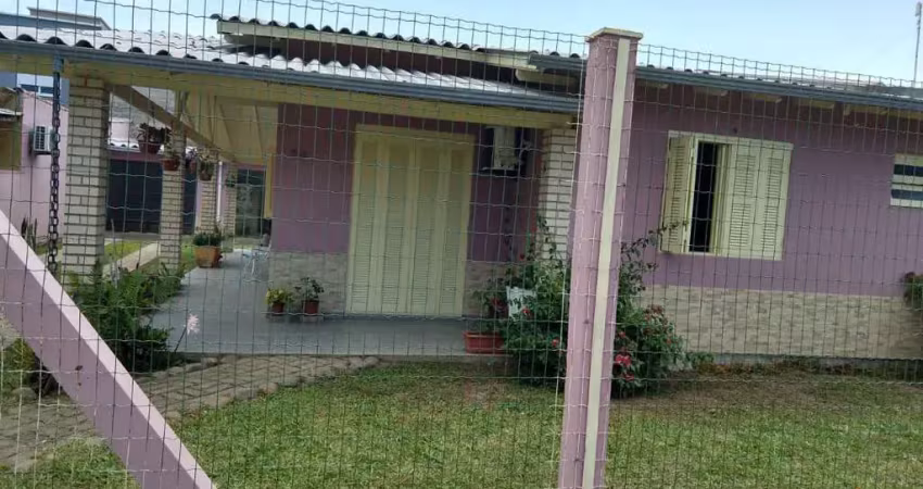 Casa com churrasqueira e jardim em imbé - temporada na harmonia