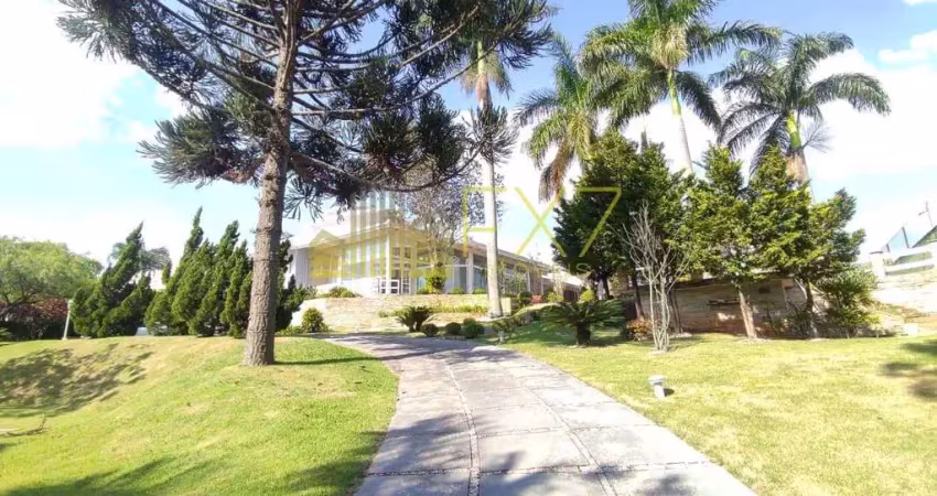 Casa à venda no bairro chácaras alpina com 5 suítes.