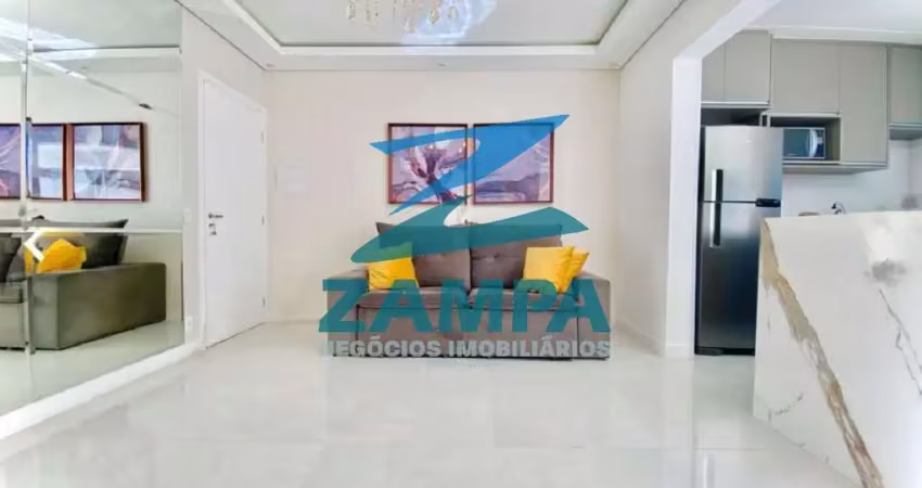 Apartamento de 2 quartos (1 suite), sala integrada com espaço gourmet e 2 vagas cobertas