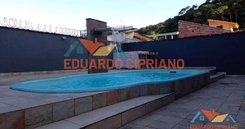 Casa com 3 dormitórios à venda, 111 m² por R$ 690.000,00 - Massaguaçu - Caraguatatuba/SP