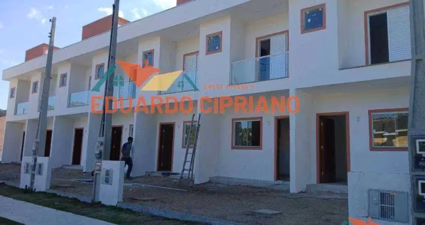 Casa com 2 dormitórios à venda, 74 m² por R$ 370.000,00 - Massaguaçu - Caraguatatuba/SP