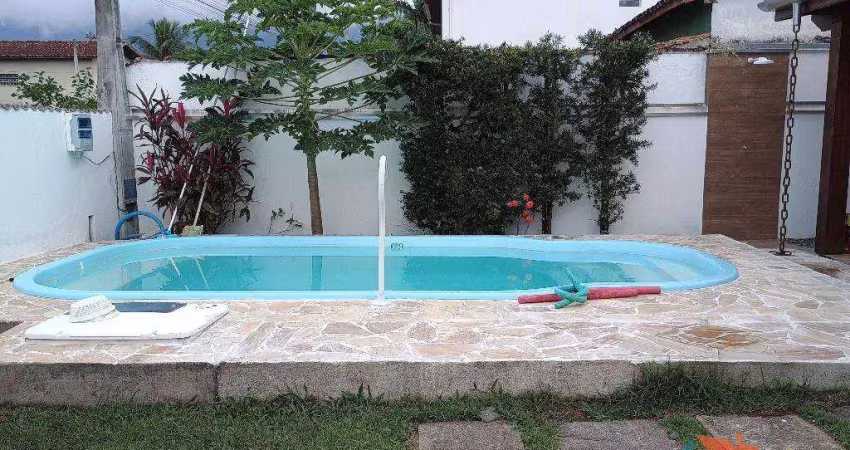Casa com 3 dormitórios para alugar por R$ 4.095,46/mês - Massaguaçu - Caraguatatuba/SP