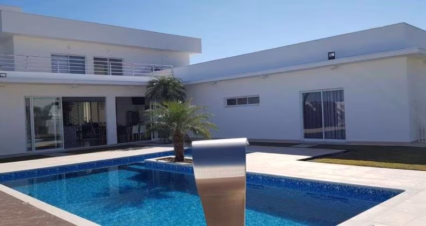 Casa de condomínio para venda com 449 metros quadrados com 5 quartos