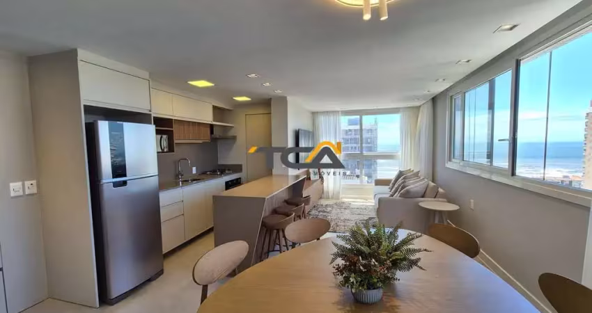 Apartamento 02 dormitórios novo finamente mobiliado a poucos metros do mar em to