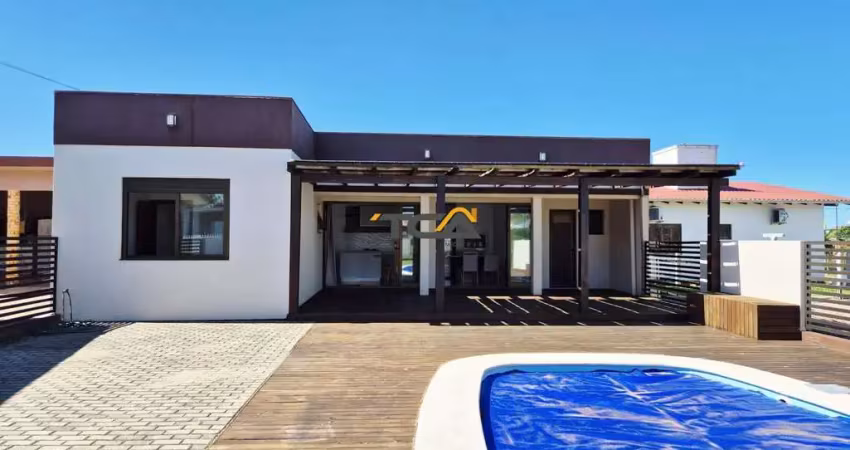 Casa com piscina apenas 100m do mar na itapeva em torres-rs