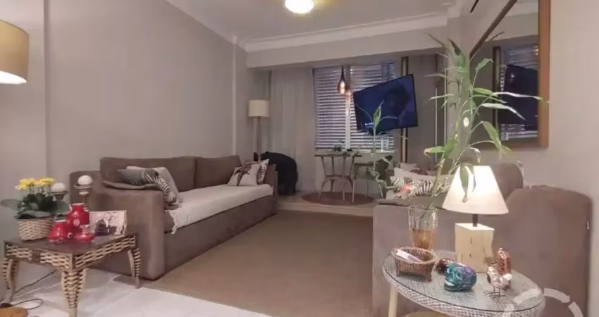 Apartamento prédio frente mar reformado 2 quartos revertido para 1 com elevador - josé menino