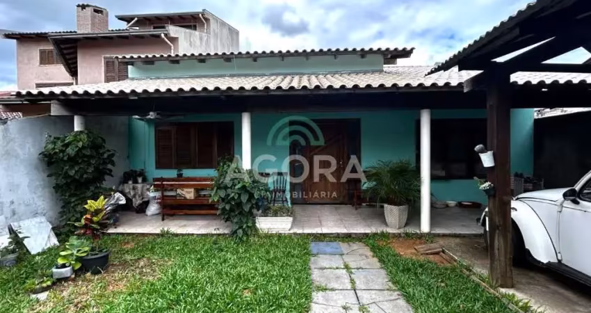 Casa térrea com 3 (três) dormitórios, localizada no bairro São José em Canoas.