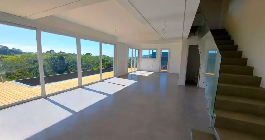 Casa com 3 suítes, 2 vagas de garagem e 239 m² privativos no Village - Garopaba/SC