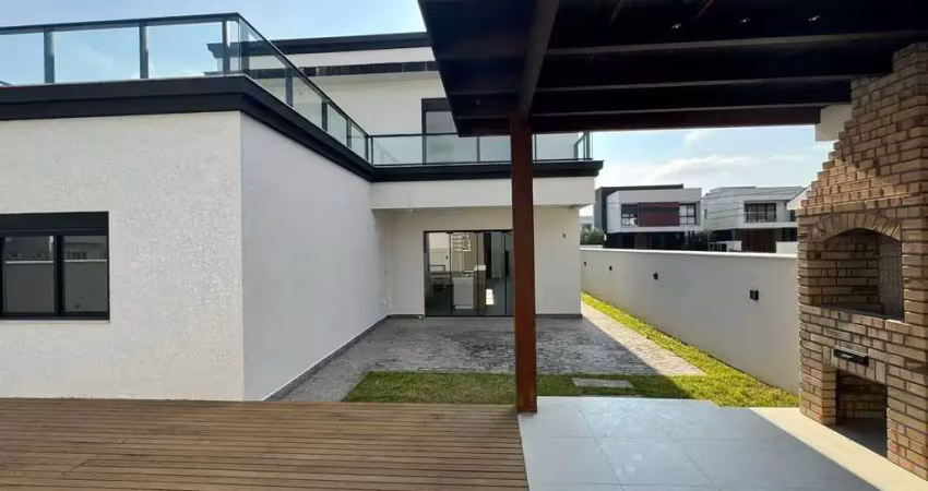 Casa em condomínio com 4 dormitórios e 4 vagas de garagem em Camboriú