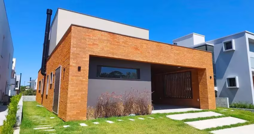 Casa com 4 suítes, 3 vagas, e 243 m² privativos na Praia do Rosa - Garopaba