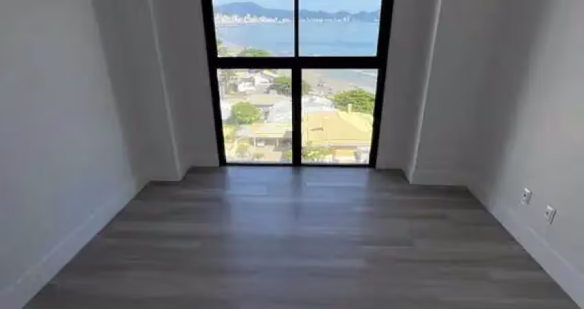 Apartamento frente mar com 3 suítes e 2 vagas de garagem na praia do perequê em porto belo
