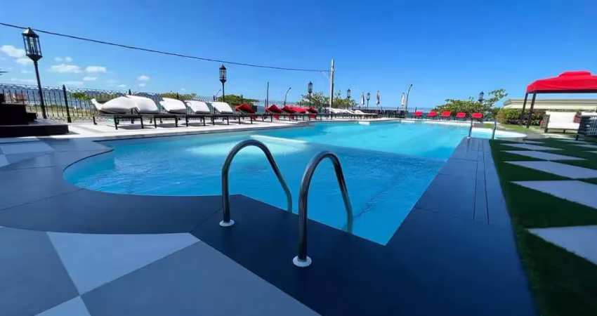 Apartamento frente mar com 4 suítes e 4 vagas de garagem em meia praia - itapema/sc
