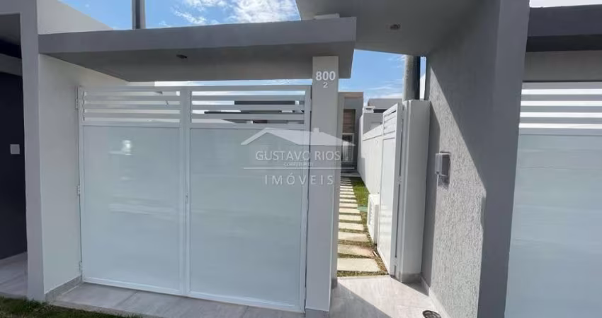 Casa 2 quartos, 2 suítes e garagem.