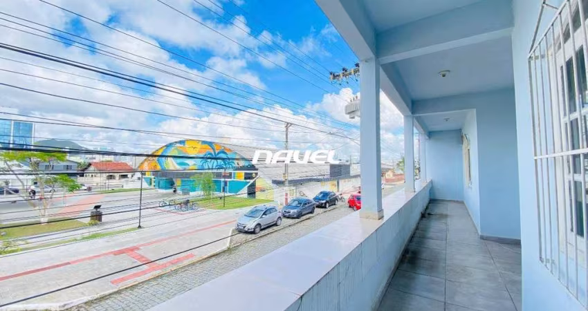 Imóvel Comercial com Duas Frentes e Terreno Amplo no Centro de Navegantes