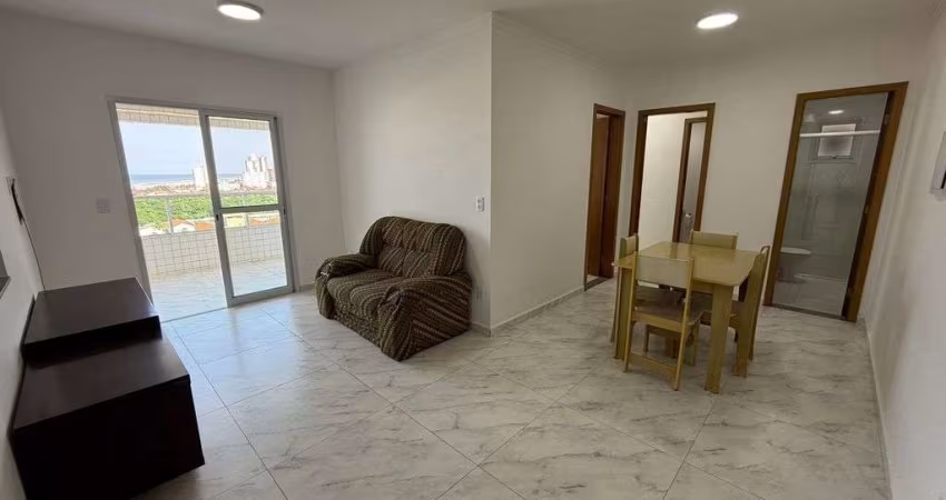 Apartamento vista mar para locação na Mirim - 2 dormitórios, sendo 1 suíte.