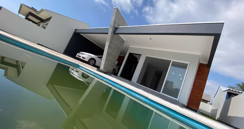 Casa a venda em Arroio do Sal-RS, perto do mar de alto padrão.