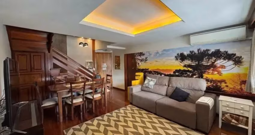 Apartamento a poucos passos da rua coberta em gramado.