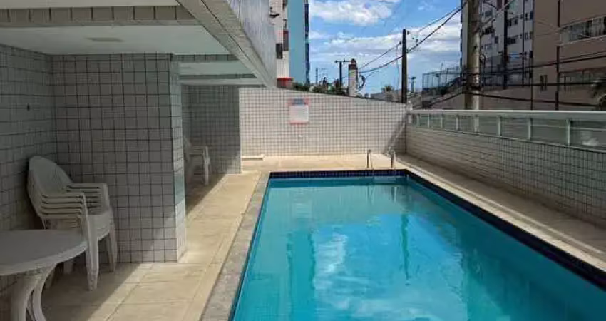 Apartamento 2 dormitórios 1 suíte na guilhermina 100 mts da orla da praia .