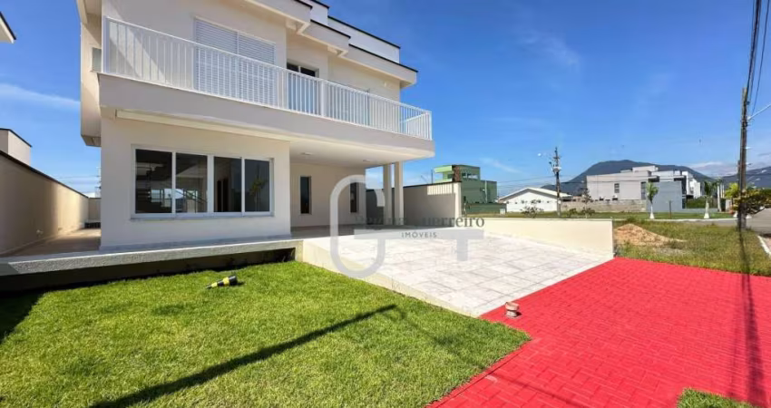 Casa com 4 dormitórios à venda, 255 m² por R$ 1.680.000,00 - Condomínio Flora Rica - Peruíbe/SP