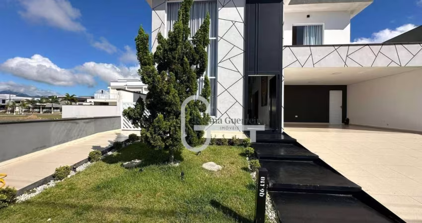 Casa com 3 dormitórios à venda, 223 m² por R$ 1.500.000,00 - Condomínio Flora Rica - Peruíbe/SP