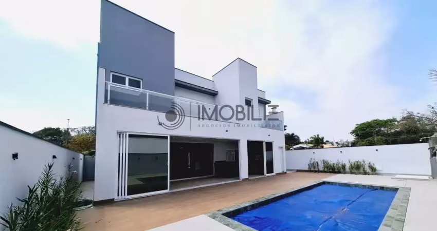 Casa com quatro suítes no condomínio santa clara em indaiatuba.