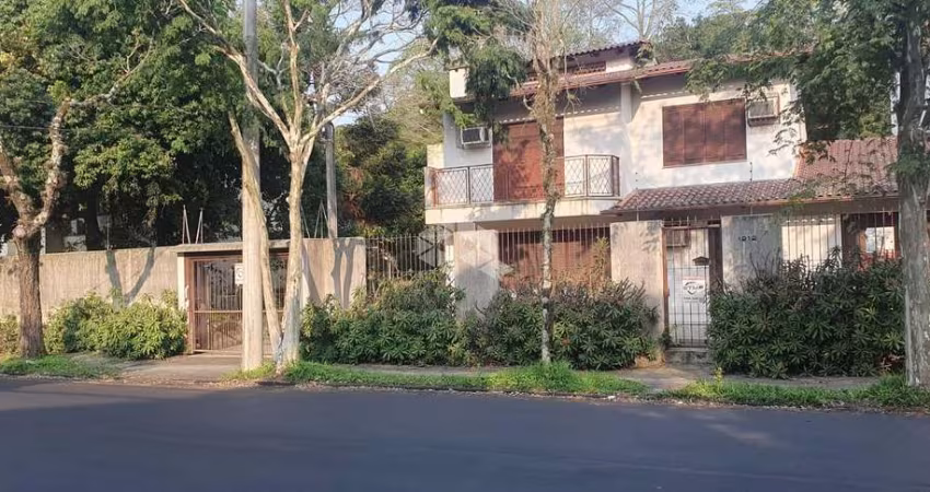 Casa com 4 quartos à venda na Avenida Fábio Araújo Santos, 1212, Nonoai, Porto Alegre