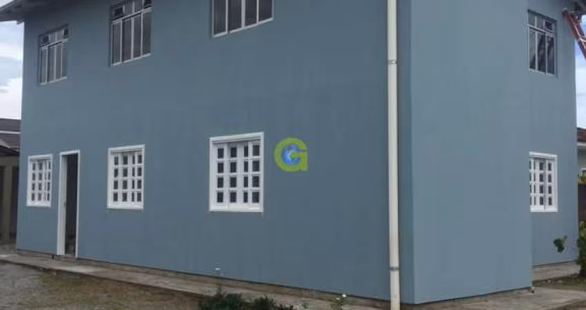 Casa comercial a venda bairro Ponte do Imaruim, em Palhoça, conta com 4 apartame