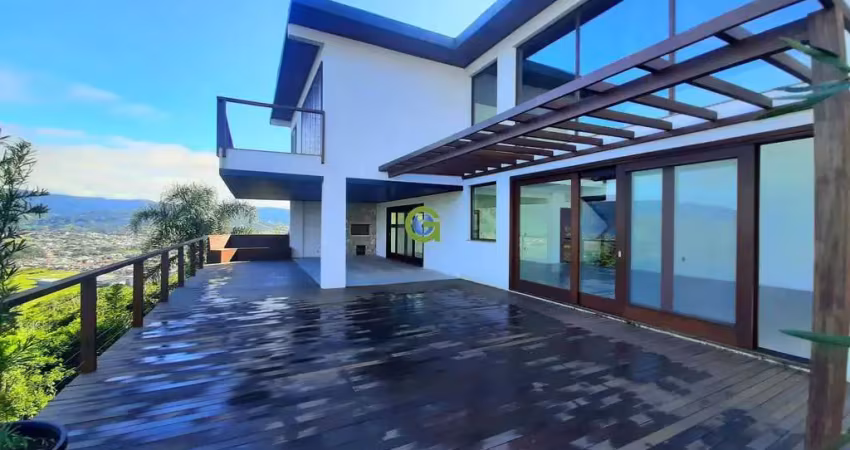 Magnífica casa alto padrão em condomínio fechado na praia da silveira, em garopa