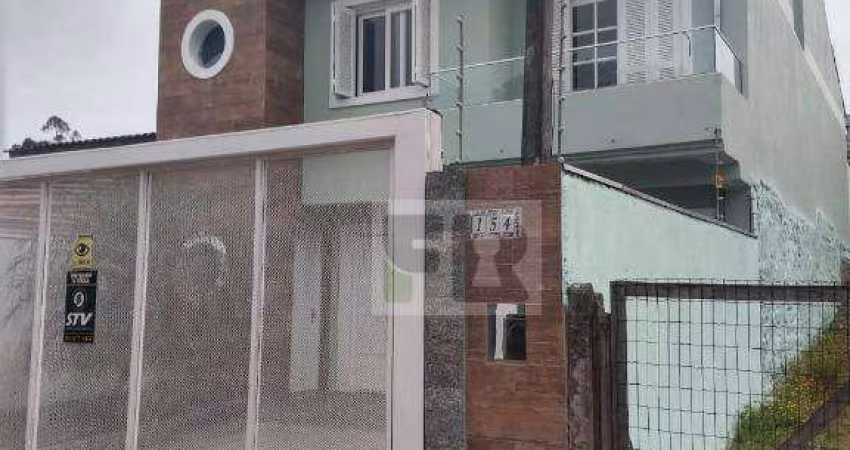 Ótimo sobrado com 3 dormitórios sendo 2 suítes á venda no bairro Moradas do Bosque em Cachoeirinha RS.