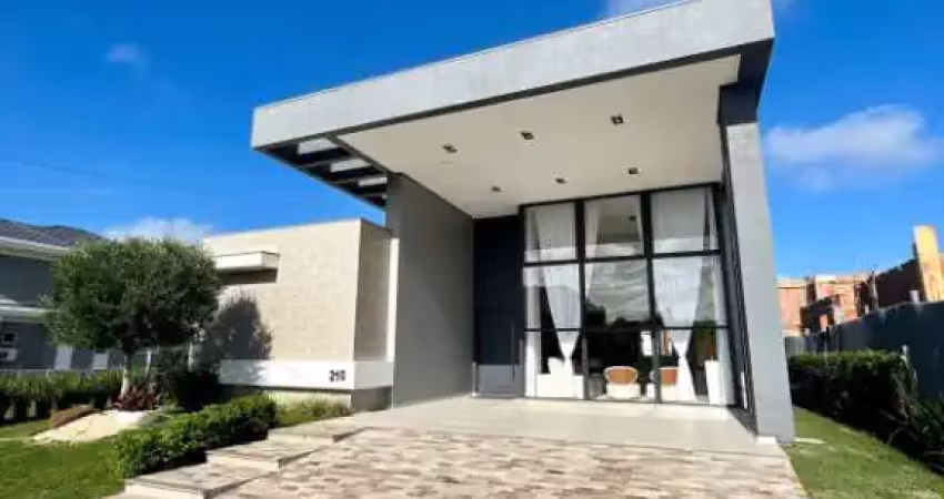 Belíssima casa a venda no condomínio marítimo em tramandaí.