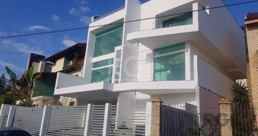 Magnífica residência nova na parte alta e nobre do bairro nonoai, próximo ao shopping barra zona sul, com vista cinematográfica para a cidade e para o guaíba. Projeto residencial diferenciado, com trê