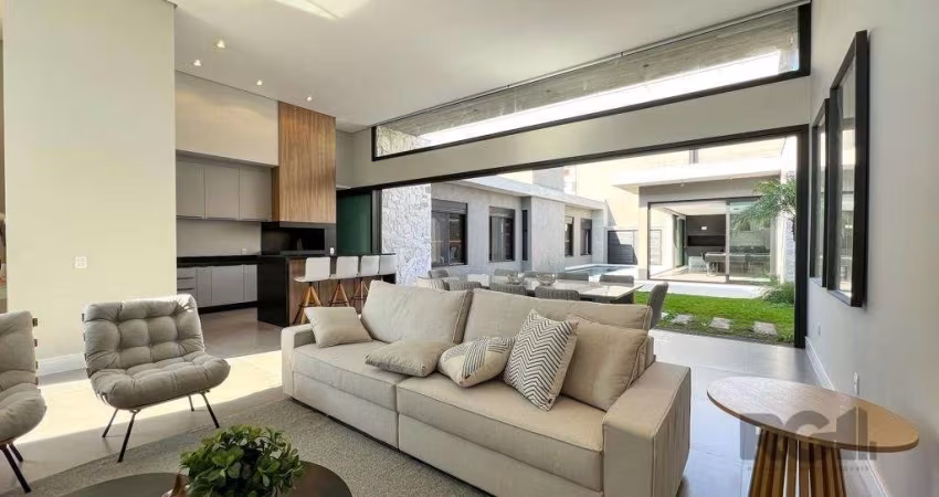 Casa maravilhosa, nunca habitada, localizada em área nobre de Atlântida. Alto padrão construtivo com 4 suítes, sendo  uma master, 2 lavabos, jardinagem pronta com irrigação e iluminação, esquadrias de