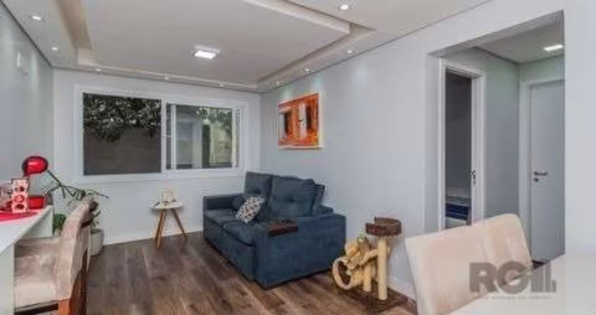 Excelente apartamento com dois dormitórios, dentre eles uma suíte, cozinha americana com churrasqueira e integrada com área de serviço, imóvel impecável, pisos novos, gesso com iluminação projetada, a
