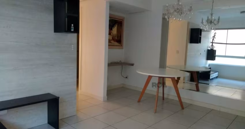Apartamento de 02 (dois) dormitórios sendo um deles suíte, semi mobiliado, duas vagas de garagem, ar condicionado em todos ambientes, cozinha montada com eletrodomésticos, aquecedor de água e churrasq