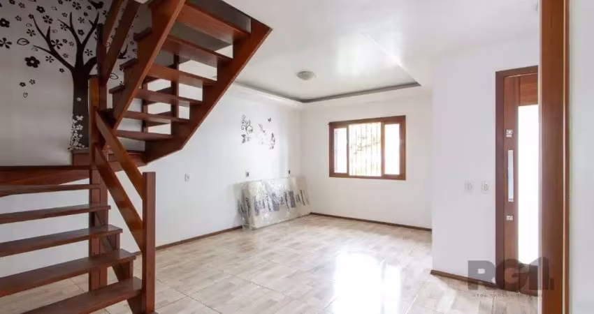 Casa residencial para locação no bairro Cavalhada, com aproximadamente 170m² de área privativa, piso ceramico, 03 dormitorios sendo 02 suites, living 02 ambientes, cozinha americana com pia e armarios