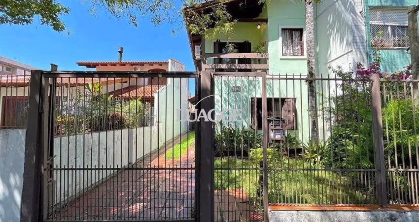 casa com 3 dormitórios, sendo 1 suíte, vaga para 4 carros, no bairro Santana