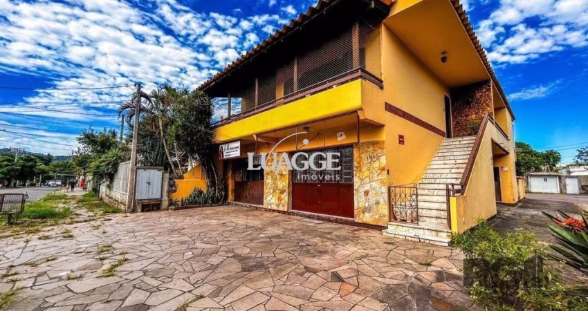 Casa com 2 salas comerciais, 3 quartos, vaga de garagem churrasqueira, suíte, no bairro Cavalhada, Porto Alegre/RS