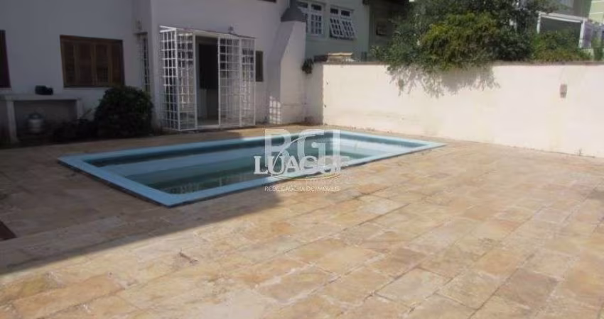 Casa Condominio para Venda - 383.4m², 5 dormitórios, sendo 2 suites, 3 vagas - Nonoai