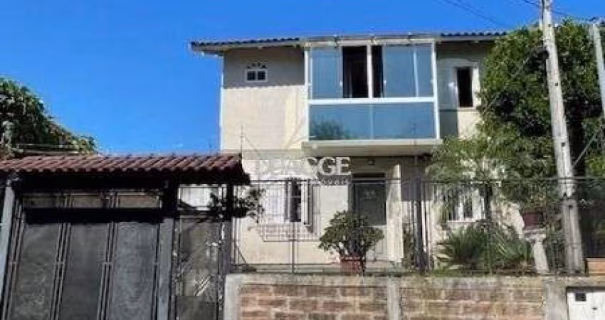 Casa em Porto Alegre, no bairro Vila Nova, com 3 dormitório(s), e 3 banheiros, à venda.