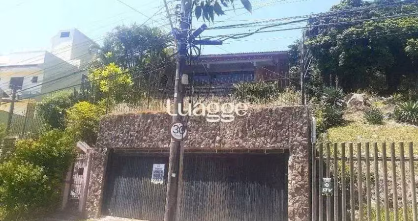 Casa com 5 quartos à venda na Rua Alcebíades Antônio dos Santos, 359, Nonoai, Porto Alegre