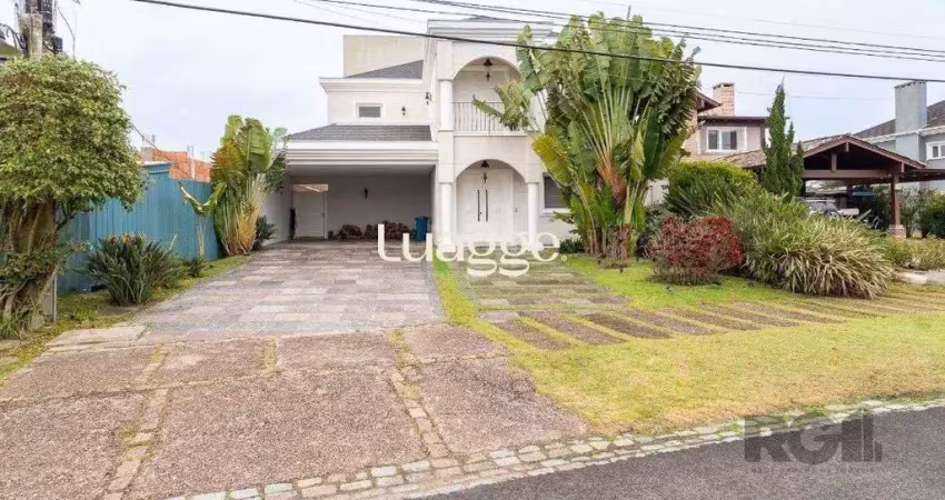 Casa em condomínio fechado com 3 quartos à venda na Avenida Juca Batista, 9067, Belém Novo, Porto Alegre