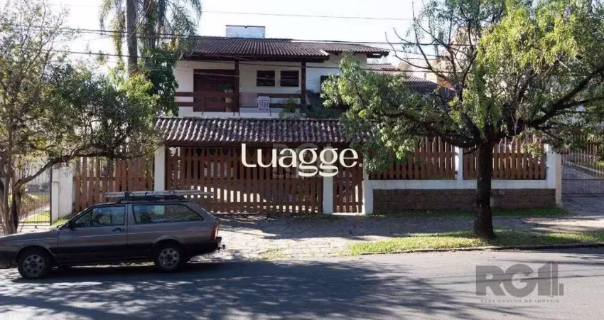 Casa com 4 quartos à venda na Rua Upamaroti, 874, Cristal, Porto Alegre