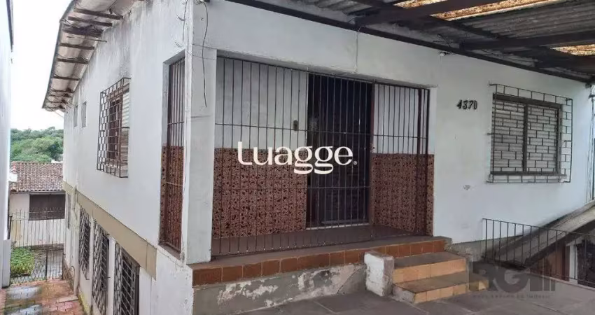 Casa com 3 quartos à venda na Avenida da Cavalhada, 4421, Cavalhada, Porto Alegre