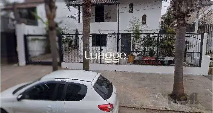 Casa com 4 quartos à venda na Rua Barão de Cerro Largo, 92, Menino Deus, Porto Alegre
