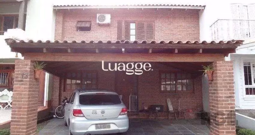 Casa em condomínio fechado com 3 quartos à venda na Avenida Juca Batista, 1524, Cavalhada, Porto Alegre